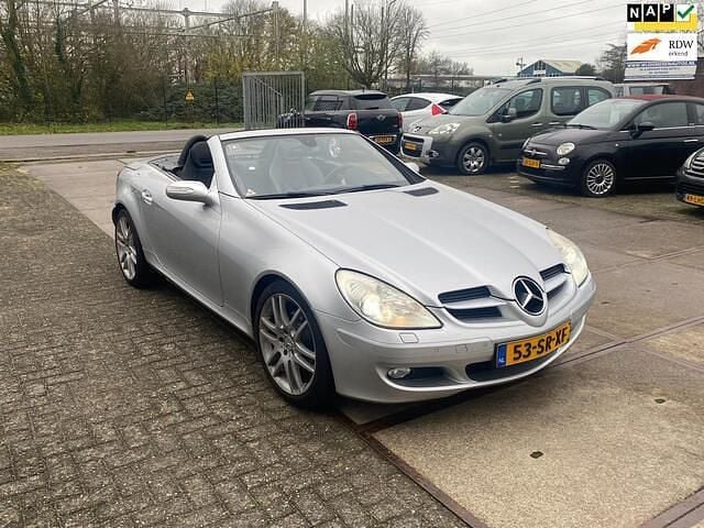 Grijs (metallic) Gebruikt 2006 Mercedes SLK280 Cabriolet | € 8.995 (Goede deal) - Afbeelding 1/4