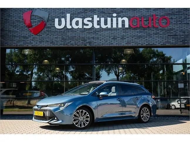 Blauw, metallic lak Gebruikt 2019 Toyota Corolla Style Stationwagen | € 21.900 (Eerlijke prijs) - Afbeelding 1/4