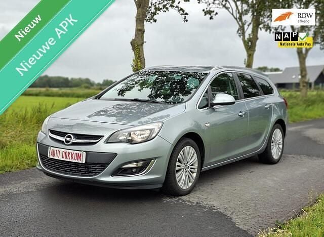 Grijs Gebruikt 2013 Opel Astra Stationwagen | € 4.975 (Eerlijke prijs) - Afbeelding 1/4
