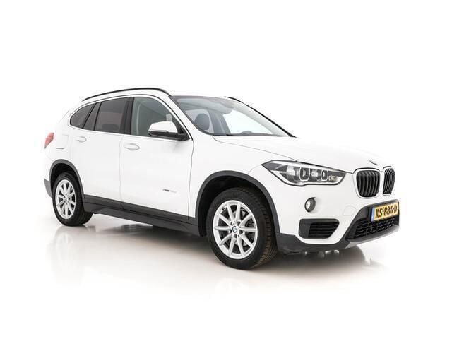 Mineral white metallic tricoat (wit metallic) Gebruikt 2016 BMW X1 Executive SUV | € 11.245 - Afbeelding 1/4