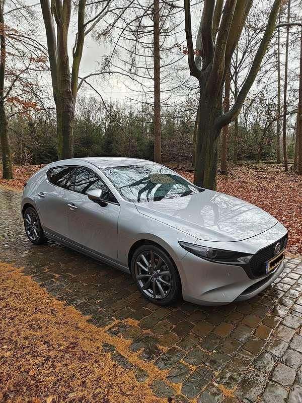 Grijs Gebruikt 2020 Mazda 3 Luxury Hatchback | € 25.000 (Iets duurder) - Afbeelding 1/4