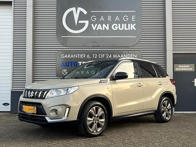 Beige (metallic) Gebruikt 2019 Suzuki Vitara SUV | € 17.995 (Eerlijke prijs) - Afbeelding 1/3