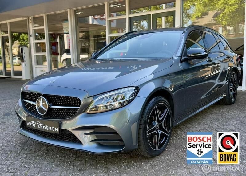 Grijs Gebruikt 2021 Mercedes C300 AMG Stationwagen | € 26.800 (Goede deal) - Afbeelding 1/4