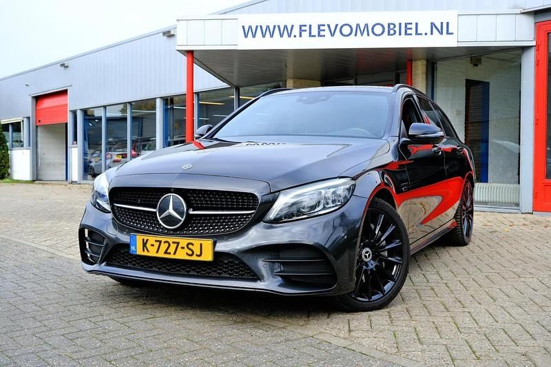 Grijs (metallic) Gebruikt 2021 Mercedes C300 Business Stationwagen | € 22.450 (Super prijs) - Afbeelding 1/4