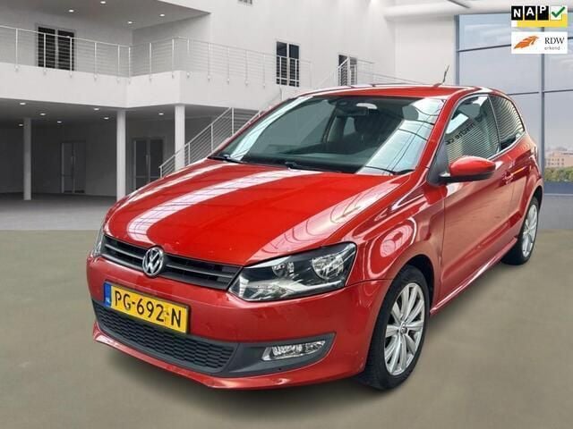 Oranje Gebruikt 2011 VW Polo Comfortline Hatchback | € 3.895 (Goede deal) - Afbeelding 1/4