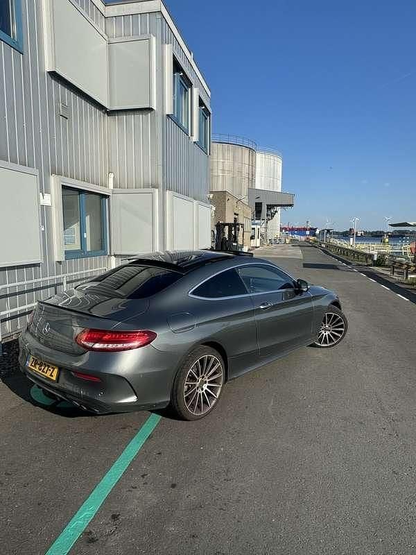 Grijs Gebruikt 2016 Mercedes C250 Prestige Coupé | € 23.000 (Eerlijke prijs) - Afbeelding 1/4