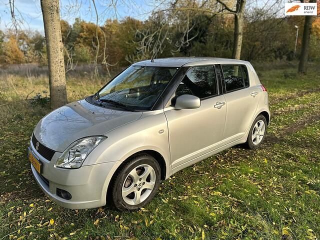 Grijs Gebruikt 2006 Suzuki Swift Exclusive Hatchback | € 5.000 (Goede deal) - Afbeelding 1/4