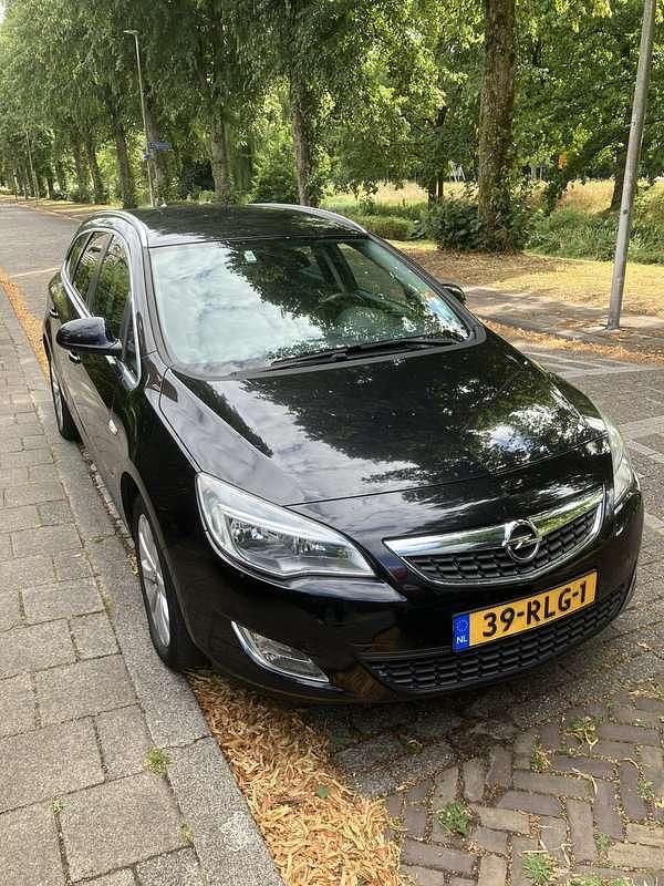 Zwart Gebruikt 2011 Opel Astra Cosmo Stationwagen | € 1.850 (Super prijs) - Afbeelding 1/4