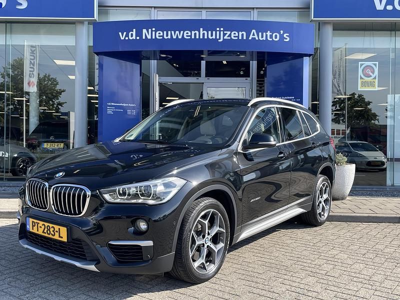 Zwart Gebruikt 2017 BMW X1 Executive SUV | € 24.950 (Eerlijke prijs) - Afbeelding 1/4