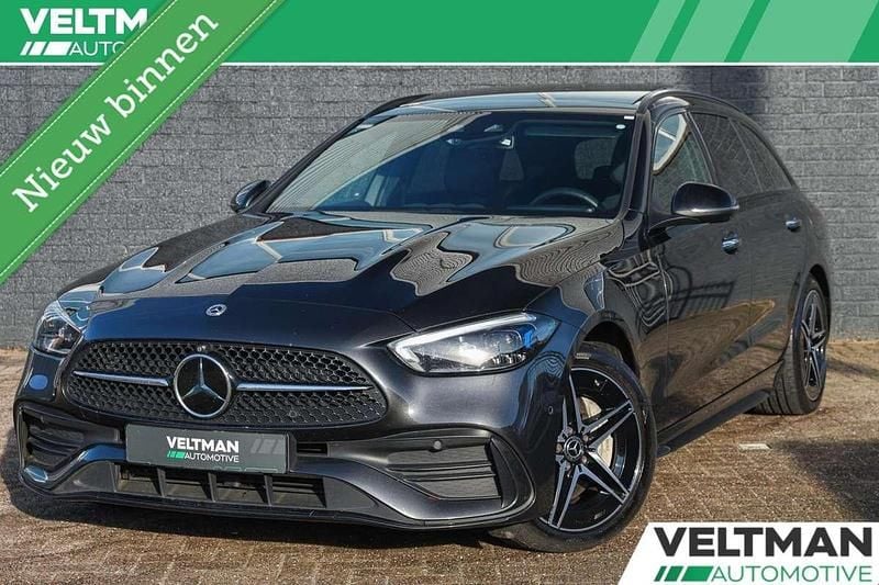 Grijs Occasion 2022 Mercedes C300e AMG line Stationwagen | € 36.795 (Eerlijke prijs) - Afbeelding 1/4