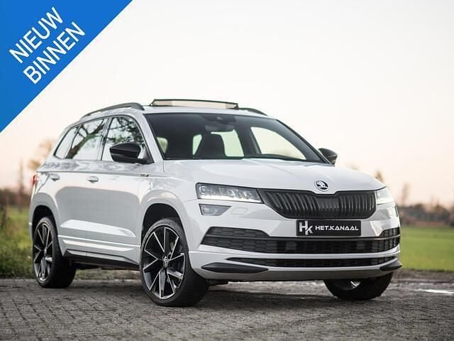 Wit (metallic) Gebruikt 2020 Skoda Karoq Business Line SUV | € 26.950 (Goede deal) - Afbeelding 1/4