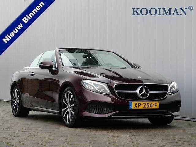 Paars (metallic) Gebruikt 2019 Mercedes E200 Premium Plus Cabriolet | € 37.950 (Eerlijke prijs) - Afbeelding 1/4