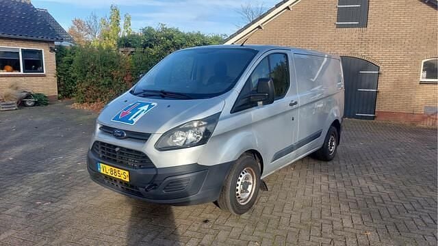 Grijs (metallic) Gebruikt 2015 Ford Transit Custom Van | € 2.500 (Goede deal) - Afbeelding 1/4