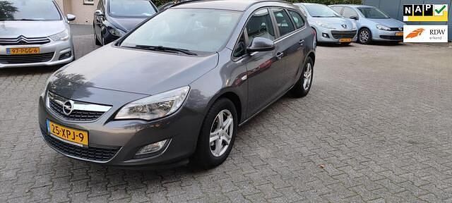 Occasion Opel Astra Business 101 PK (74 kW) 2012 Grijs (metallic) Stationwagen