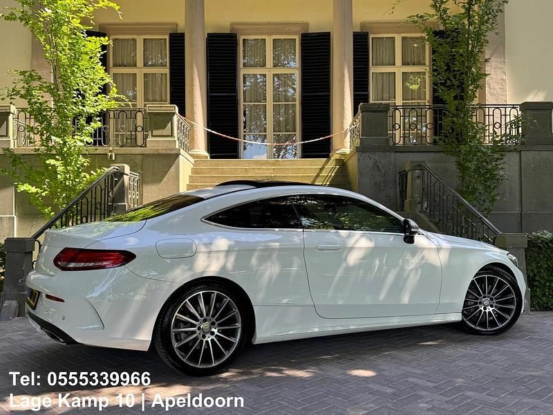 Occasion Mercedes C180 AMG line 157 PK (115 kW) 2016 Wit Coupé
