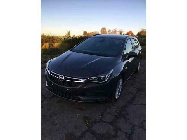Zwart Gebruikt 2016 Opel Astra Stationwagen | € 12.950 (Iets duurder) - Afbeelding 1/4
