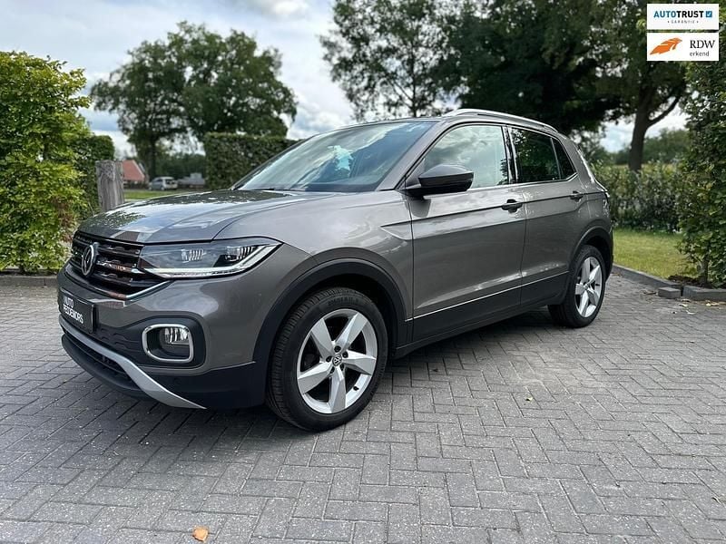 Grijs Gebruikt 2020 VW T-Cross Style SUV | € 21.550 (Goede deal) - Afbeelding 1/4
