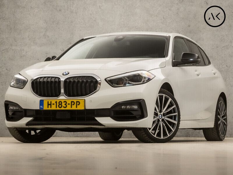 Wit Gebruikt 2020 BMW 118 Sport Line Hatchback | € 19.945 - Afbeelding 1/4