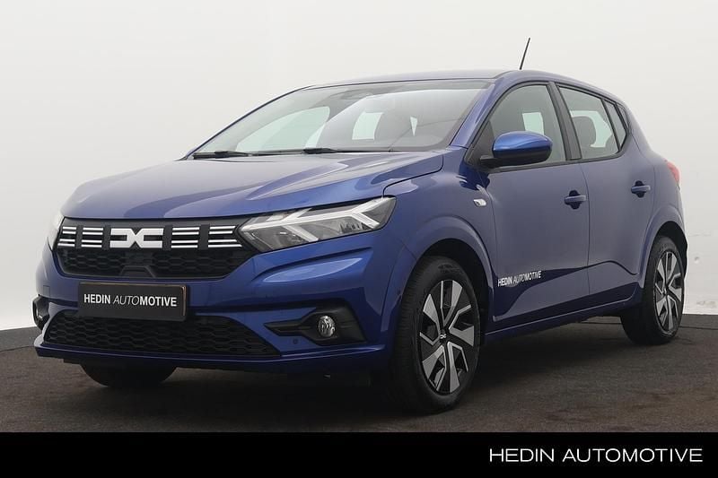 Blauw Gebruikt 2024 Dacia Sandero Expression Hatchback | € 18.450 (Eerlijke prijs) - Afbeelding 1/3