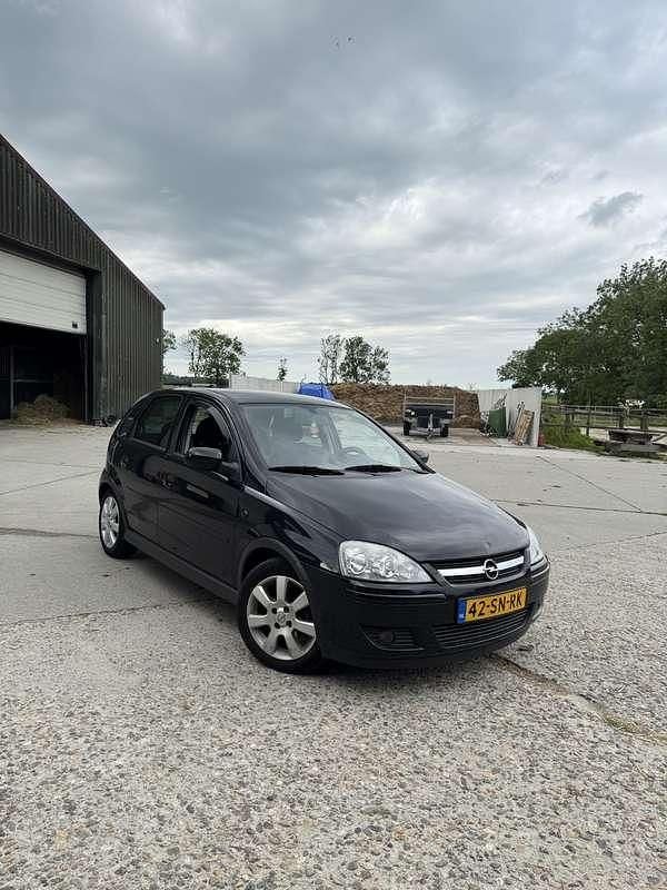 Zwart Occasion 2006 Opel Corsa Hatchback | € 999 (Super prijs) - Afbeelding 1/4
