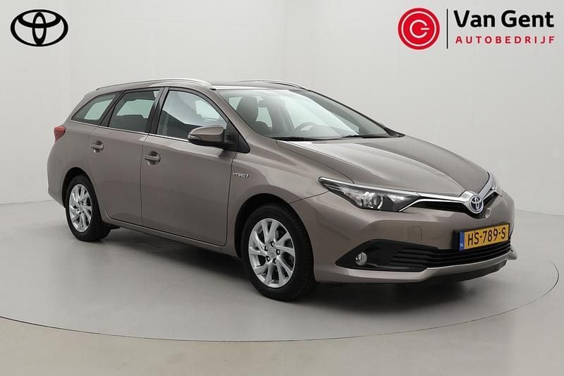 Bruin Gebruikt 2015 Toyota Auris Touring Sports Stationwagen | € 15.999 (Eerlijke prijs) - Afbeelding 1/4