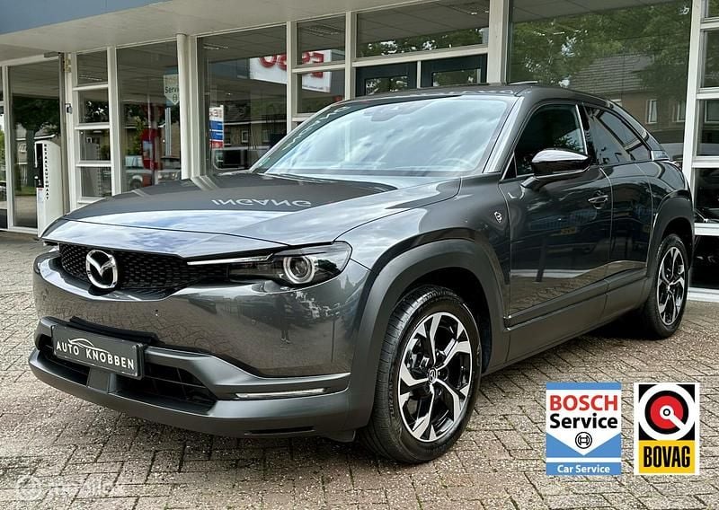 Grijs, metallic lak Gebruikt 2023 Mazda MX30 Makoto SUV | € 25.800 (Super prijs) - Afbeelding 1/4