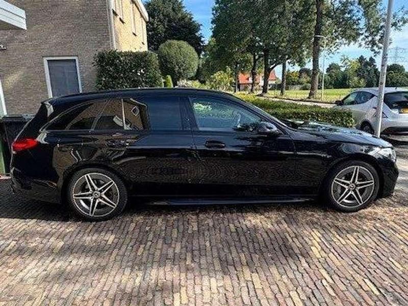 Zwart Gebruikt 2022 Mercedes C180 AMG line Stationwagen | € 33.999 (Super prijs) - Afbeelding 1/4