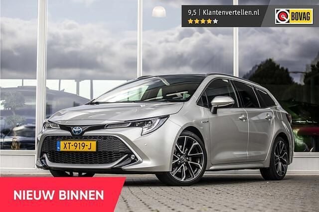 Grijs, metallic lak Gebruikt 2019 Toyota Corolla Premium Stationwagen | € 24.800 (Eerlijke prijs) - Afbeelding 1/4