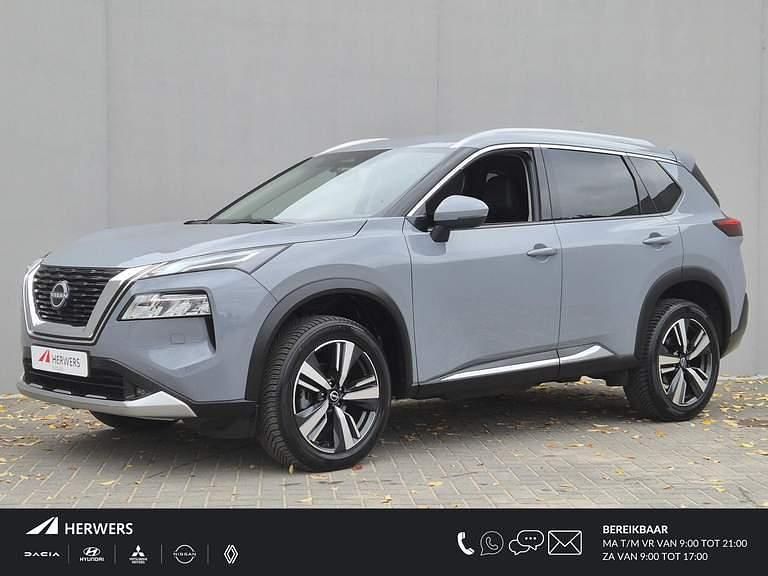Ceramic grey metallic (kby) Gebruikt 2024 Nissan X-Trail Tekna SUV | € 38.885 (Eerlijke prijs) - Afbeelding 1/4