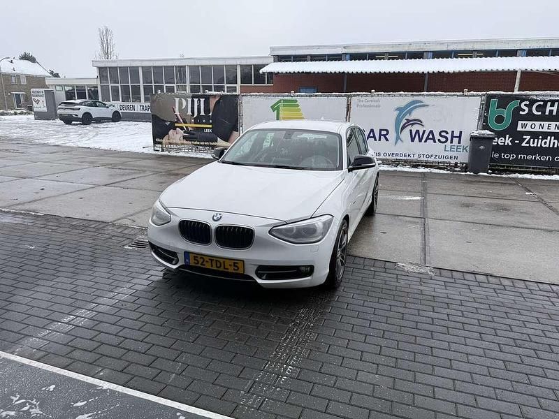 Wit Occasion 2012 BMW 116 Hatchback | € 5.500 (Goede deal) - Afbeelding 1/4