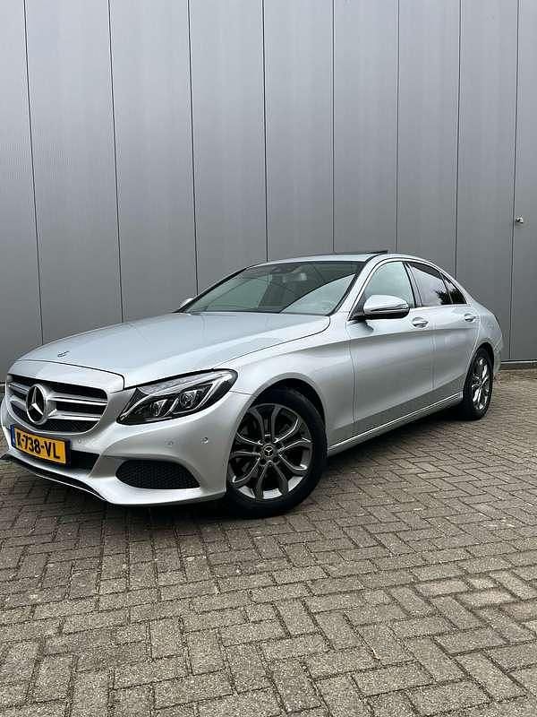 Grijs Gebruikt 2017 Mercedes C180 Business Sedan | € 17.495 (Goede deal) - Afbeelding 1/4
