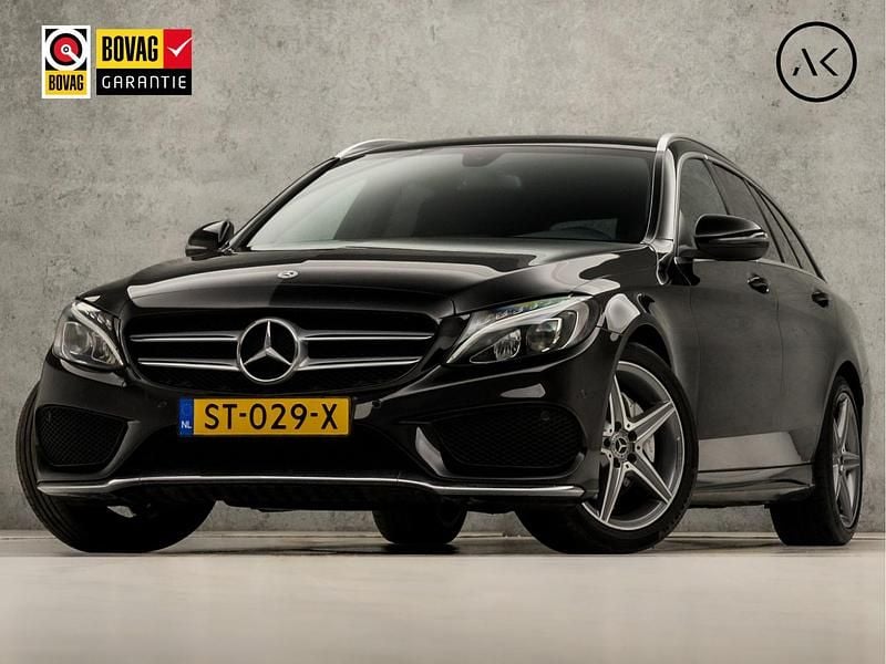 Zwart Gebruikt 2018 Mercedes C180 AMG Stationwagen | € 21.445 (Goede deal) - Afbeelding 1/4