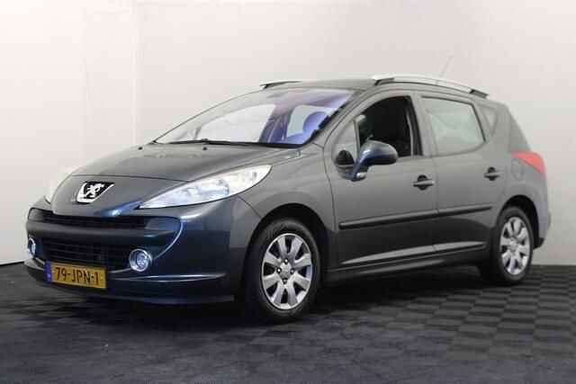 Grijs Gebruikt 2009 Peugeot 207 Stationwagen | € 2.750 (Eerlijke prijs) - Afbeelding 1/4