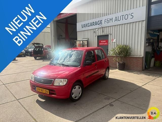Rood Gebruikt 2003 Daihatsu Cuore Hatchback | € 950 (Goede deal) - Afbeelding 1/4