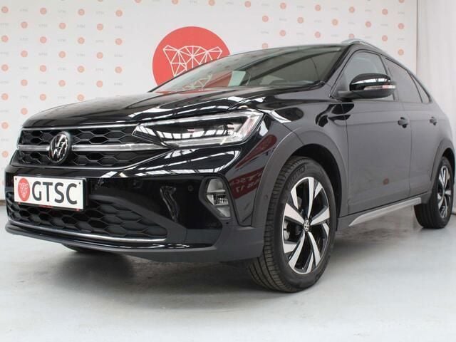 Zwart Gebruikt 2023 VW Taigo Style SUV | € 23.995 (Super prijs) - Afbeelding 1/4