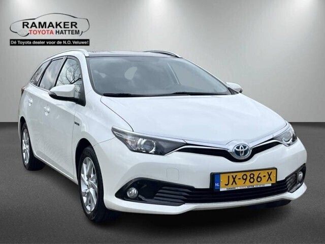 Wit Gebruikt 2016 Toyota Auris Hybrid Trend Stationwagen | € 16.901 (Iets duurder) - Afbeelding 1/4