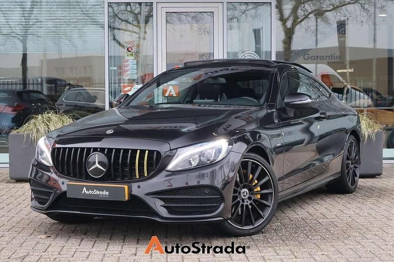 Zwart (metallic) Occasion 2018 Mercedes C180 AMG line Coupé | € 25.700 (Goede deal) - Afbeelding 1/4