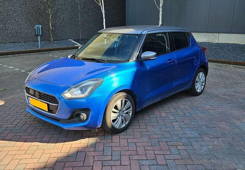 Blauw Gebruikt 2018 Suzuki Swift Style Hatchback | € 12.500 (Eerlijke prijs) - Afbeelding 1/4