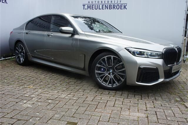 Grijs, metallic lak Gebruikt 2020 BMW 750 Executive Sedan | € 74.950 - Afbeelding 1/4