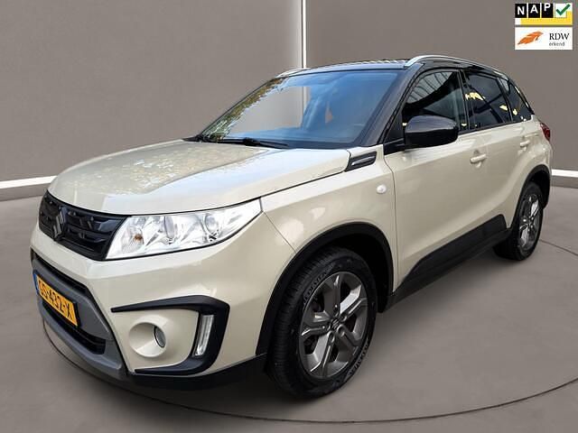 Bruin (metallic) Gebruikt 2015 Suzuki Vitara Exclusive SUV | € 15.950 (Eerlijke prijs) - Afbeelding 1/4