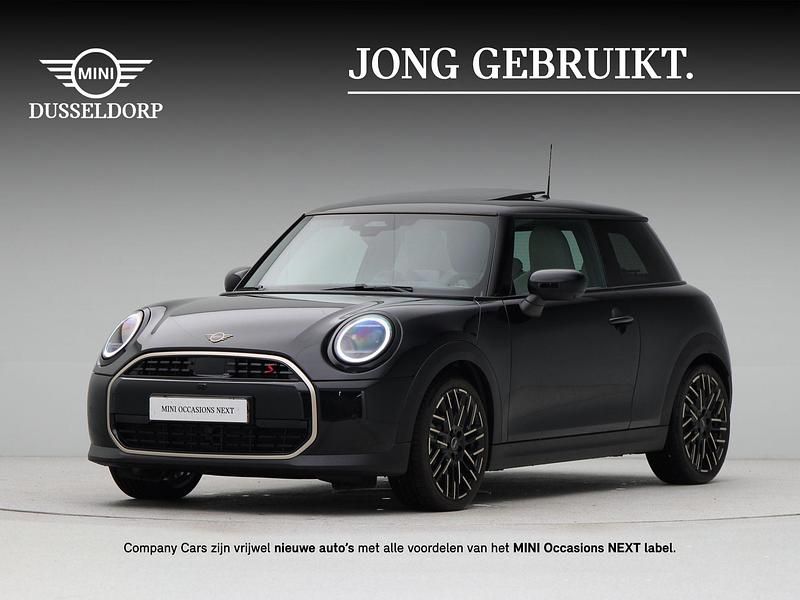 Midnight black ii (zwart metallic) Nieuw 2025 Mini Cooper S Favoured Hatchback | € 43.800 (Eerlijke prijs) - Afbeelding 1/4