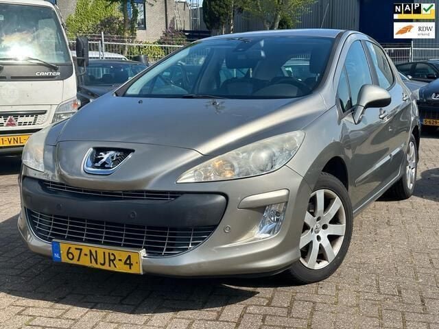 Grijs Gebruikt 2010 Peugeot 308 Hatchback | € 650 (Goede deal) - Afbeelding 1/4
