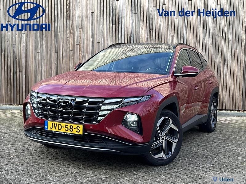 Sunset red metallic (wr6) Occasion 2021 Hyundai Tucson Premium SUV | € 28.880 (Eerlijke prijs) - Afbeelding 1/4