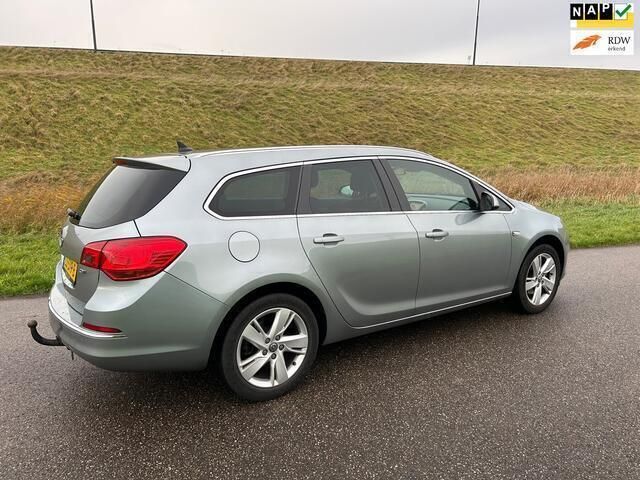 Grijs Gebruikt 2016 Opel Astra Business Stationwagen | € 6.500 (Eerlijke prijs) - Afbeelding 1/4