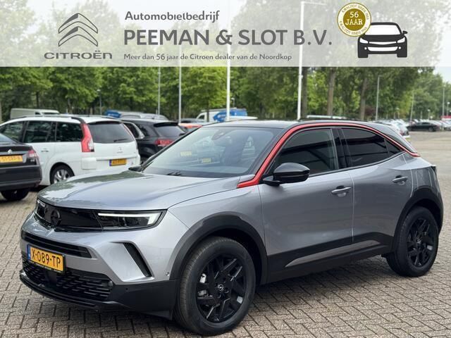 Grijs Gebruikt 2024 Opel Mokka-e SUV | € 22.850 (Eerlijke prijs) - Afbeelding 1/4