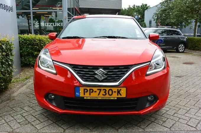 Rood, andere lak Gebruikt 2017 Suzuki Baleno Exclusive Hatchback | € 13.950 (Eerlijke prijs) - Afbeelding 1/4