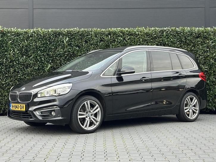 Zwart Gebruikt 2015 BMW 220 Sport Line MPV | € 9.950 - Afbeelding 1/4