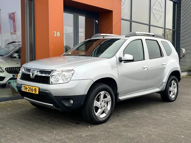 Grijs Gebruikt 2012 Dacia Duster SUV | € 6.890 (Eerlijke prijs) - Afbeelding 1/4