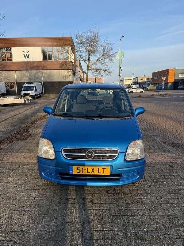 Blauw Occasion 2003 Opel Agila Comfort Hatchback | € 1.000 (Eerlijke prijs) - Afbeelding 1/4