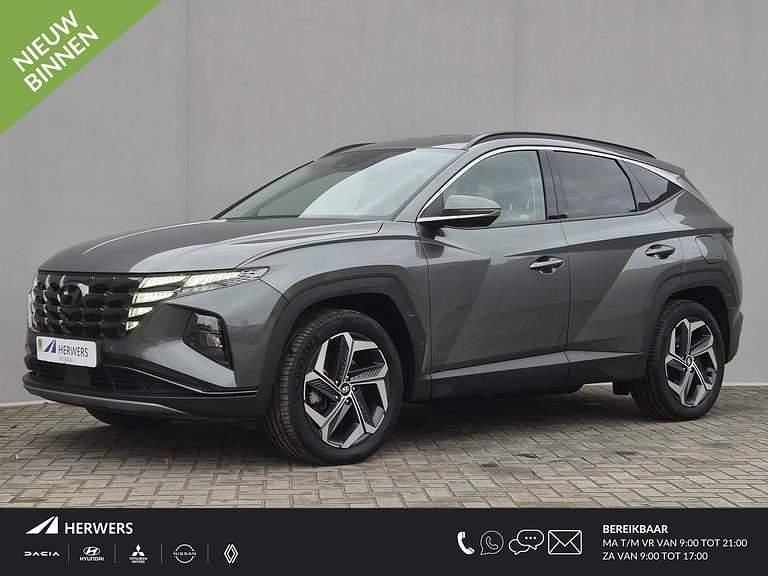 Amazon gray metallic (a5g) Gebruikt 2022 Hyundai Tucson Comfort SUV | € 28.935 (Super prijs) - Afbeelding 1/4